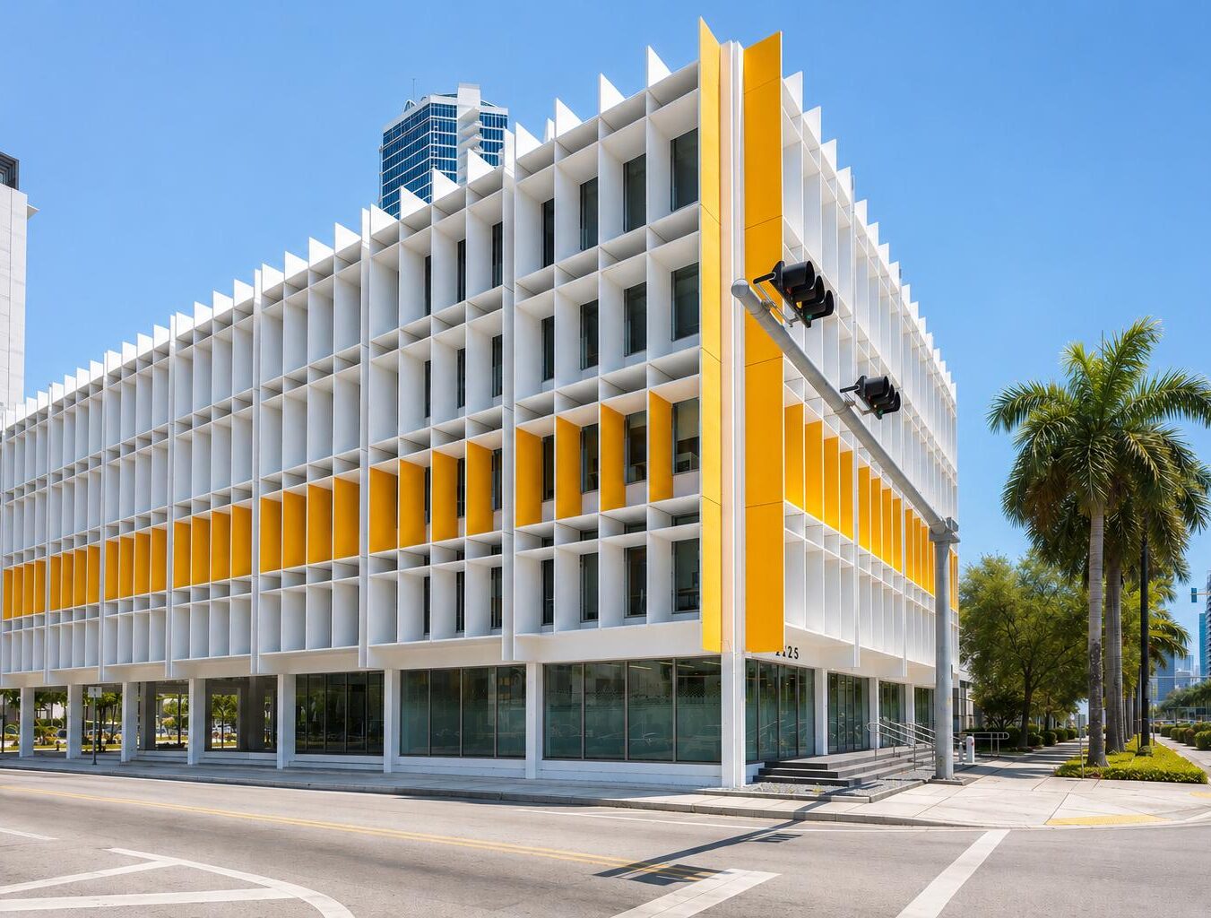 The Biscayne's white Art Deco facade with yellow fins at 2125 Biscayne Boulevard